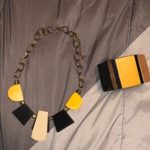 Bulky necklace and bracelet.